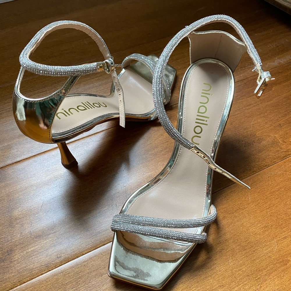Ninalilou rhinestone strap heals. Never worn brand new. Made in San Marino
